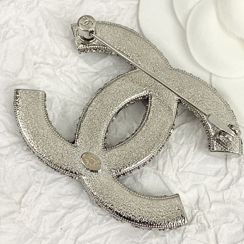 Ch**el brooches